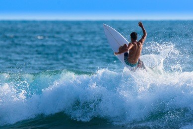riding the waves. costa rica, surfing paradise