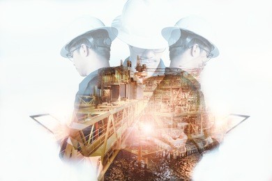 double exposure of engineer or technician man with safety helmet operated platform or plant by using tablet with offshore oil and gas platform background for oil and gas business concept