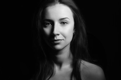 young beautiful woman fashion portrait black and white. clean skin. natural beauty without makeup.