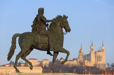 monument of louis xiv and fourviere cathedral in lyon, france.