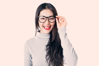 young asian woman with smiley face wearing glasses,vintage style.