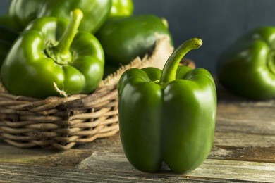 raw green organic bell peppers ready to cook with