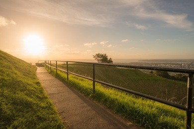 sunset over the crater of mount eden volcano in auckland, north island, new zealand.