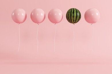 outstanding balloon watermelon concept on pastel pink background for copy space. minimal concept.