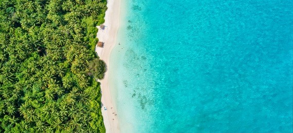 aerial photo of beautiful paradise maldives tropical beach on island. summer and travel vacation concept.