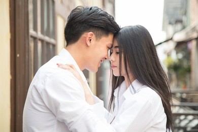 asian lover join together in summer light (love couple or pre-wedding concept)