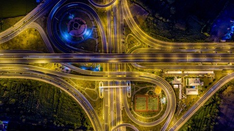 aerial top view interchange of a city at night, expressway is an important infrastructure in city.