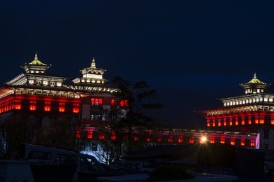 night view of tashichho dzong in thimpu, bhutan. 