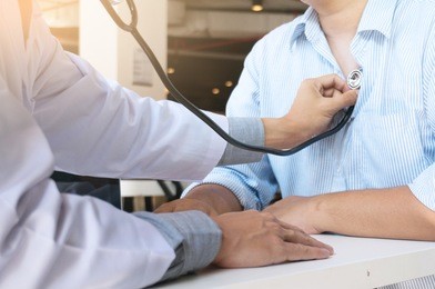 doctor check body by stethoscope