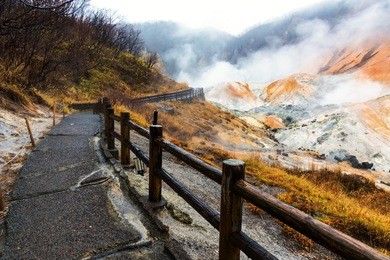 wet walking trail to jigokudani hell valley, noboribetsu, hokkaido, japan