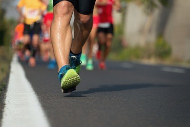 marathon running race, runners feet on road