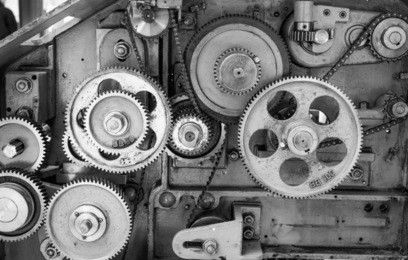 a vintage textile machine used to produce wool and other textile products.  