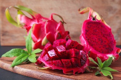 dragon fruit on a wooden board