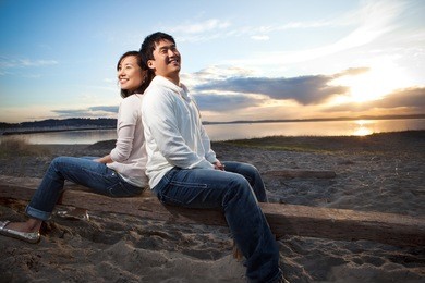 a portrait of an asian couple having fun outdoor