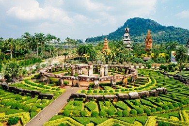 nong nooch tropical botanical garden is a 500-acre botanical garden and tourist attraction at kilometer 163 on sukhumvit road in chonburi province, thailand.