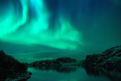 northern lights over the lofoten islands in norway
