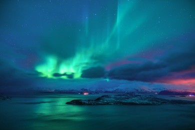 aurora borealis in the starry night of norway