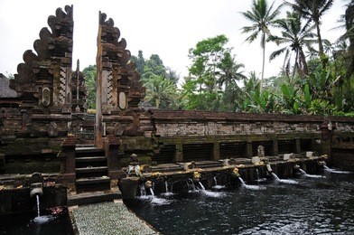 the pool of holy springs at tirta empul, bali indonesia.