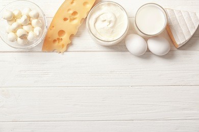 different dairy products on wooden table