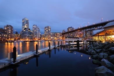 night scene of city from granville island, vancouver, british columbia, canada