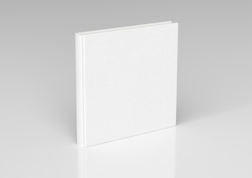white blank square book cover standing isolated on white background with clipping path. 3d render