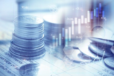 stacks of coins on banking account in the background,color filter,graphs and charts