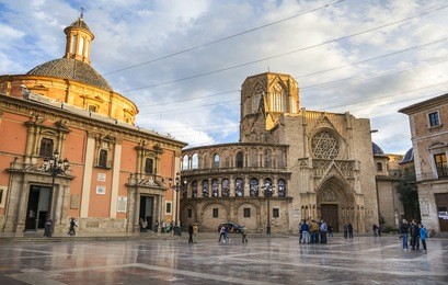 square of saint mary's (plaza de la virgen) in the light of the sunset ,beautiful tourists attraction in valencia, spain