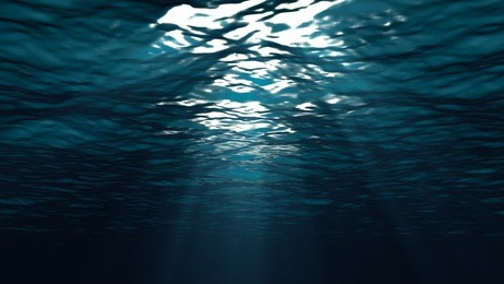 deep dark ocean waves from underwater background, light rays shining through 3d render