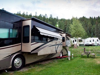 rv campsite at sunrise in pagosa springs, colorado.