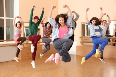 group of young hip-hop dancers in studio