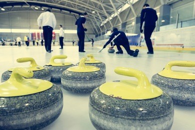 curling stone on a game sheet.