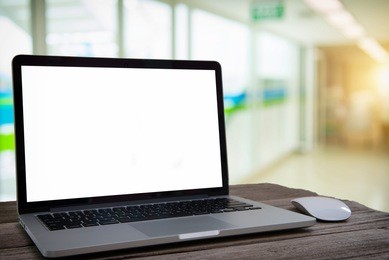 notebook with blank screen on the hospital table