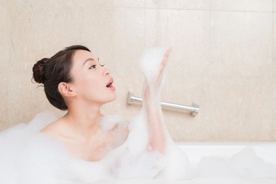 beauty woman take bath in the bathroom