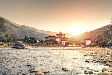 sunset at the dzong in punakha (bhutan)