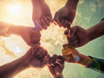 business group with hands together, teamwork concepts