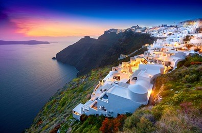 fira town on santorini island, greece. incredibly romantic sunset on santorini. oia village in the morning light. amazing sunset view with white houses. island lovers