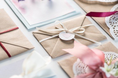 collection of envelopes or invitations isolated on white, wedding invitation card design concept 