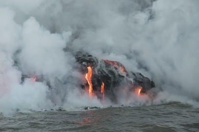 lava dripping into ocean