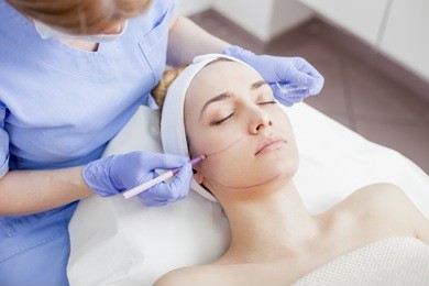face skin care. woman getting facial treatment