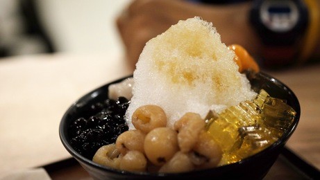 ice sweet taiwanese dessert mixed topping in black bowl