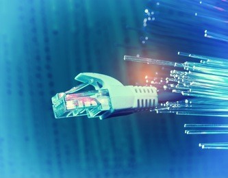 network cables closeup with fiber optical background