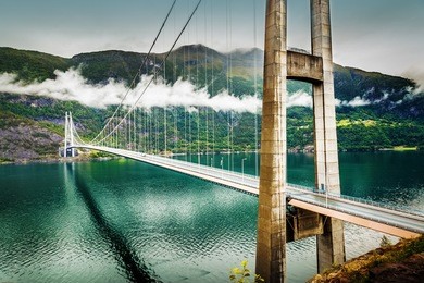 hardanger bridge - suspension bridge across the eidfjorden branch of hardangerfjorden in hordaland county, norway. the bridge connects the municipalities of ullensvang and ulvik. norway, scandinavia.