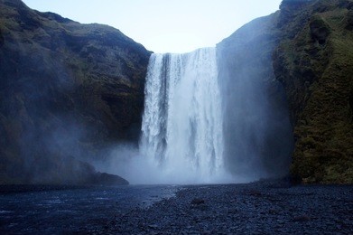 skogafoss is one of the most popular waterfalls in iceland . it is located in south iceland. due to the amount of spray the waterfall often produces a single or double rainbow on sunny days. 