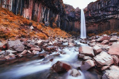 great view of svartifoss waterfall. dramatic and picturesque scene. popular tourist attraction. iceland, europe
