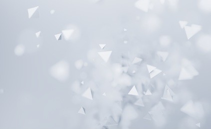 abstract 3d rendering of chaotic low poly shapes. flying polygonal pyramids in empty space. futuristic background with bokeh effect. poster design.