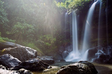 long exposure image of phnom kulen waterfall in kulen national park, siem reap province, cambodia
