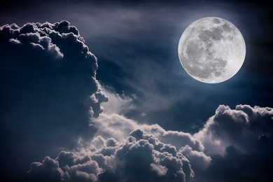 nature background. attractive photo of night sky with cloudy and bright super moon. the moon were not furnished by nasa.