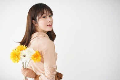 young woman having flowers