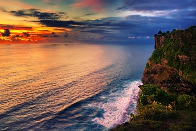 uluwatu temple in bali indonesia - nature and architecture background / sunset on bali / indonesia