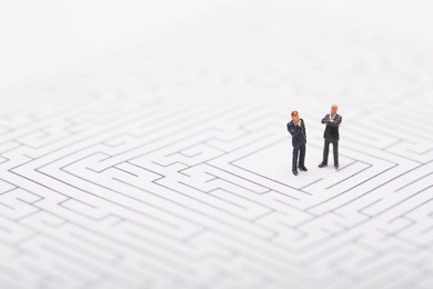 businessman trapped in maze